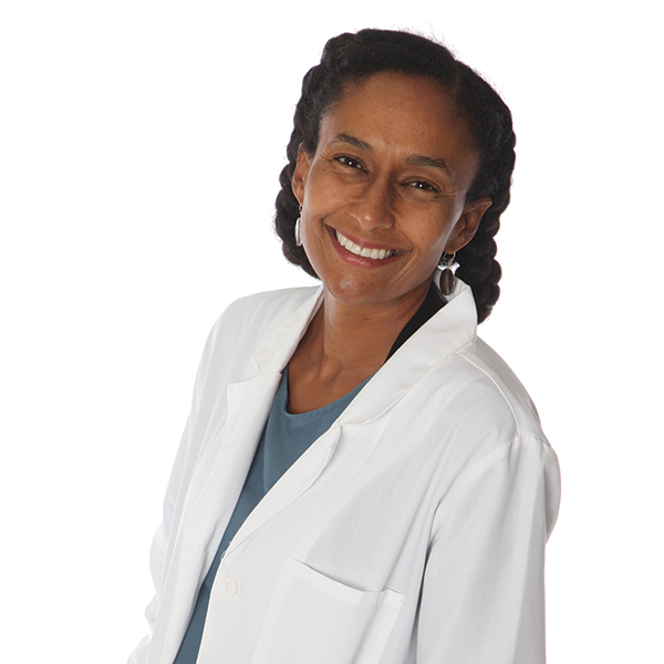 headshot image of Dr. Alexis Epperly wearing her lab coat